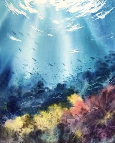 an underwater scene with fish swimming in the water