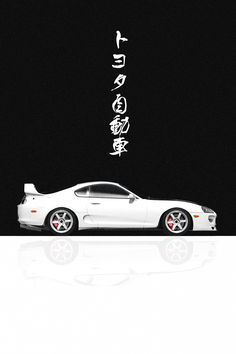 a white sports car parked in front of a black background with chinese characters on it