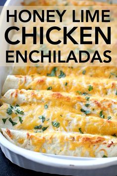 a casserole dish filled with chicken enchiladas and topped with cheese