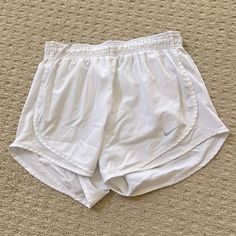 White Nike Women’s Dri Fit Tempo Running Shorts Size Small Like New Without Tags White Nike Shorts With Pockets, White Nike Bottoms For Beach, Nike White Short Leg Bottoms, White Athletic Shorts With Pockets For Spring, White Running Shorts, White Nike Shorts, Womens Athletic Shorts, Black Athletic Shorts, Running Shorts Women