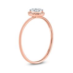 a rose gold engagement ring with an oval diamond center