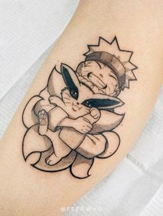 an image of a cartoon character tattoo on the arm