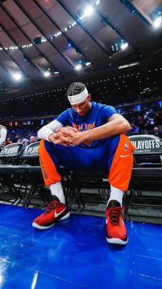 NBA basketball wallpaper background aesthetic of New York Knicks star Josh Hart sitting on the sidelines in warmup gear getting focused for a 2024 NBA playoff game Knicks Aesthetic, Nyc Aesthetic Wallpaper, Hart Wallpaper, Nyc Aesthetic