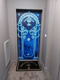 an illuminated door in the middle of a hallway with a welcome mat on the floor