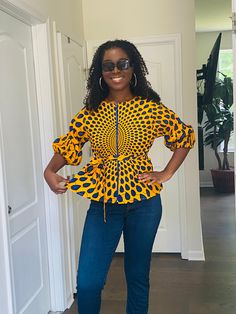 Gorgeous tunic for women.  Print is very vibrant   Top  has a zipper at the front  Loose fitting style with Zipper at the front  Very  comfortable fit  blazer comes with. belt Match it with jeans, skirt, and pants,  Model is 5.10 inches Tall African Blouses With Jeans, Top For Trousers, Ankara Tops With Jeans, Long Gown Styles, Ankara Long Gown, African Blouses, Ankara Long Gown Styles, African Tops, Skirt And Pants