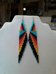 Southwestern Style Multicolor Jewelry With Black Beads, Southwestern Style Black Earrings With Colorful Beads, Handmade Black Southwestern Beaded Earrings, Handmade Southwestern Black Beaded Earrings, Southwestern Black Beaded Earrings For Festivals, Southwestern Black Festival Earrings, Southwestern Boho