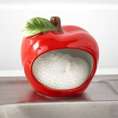 an apple shaped salt and pepper shaker