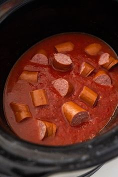 the food in the slow cooker is cooked and ready to be put into the pot