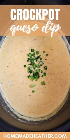 crockpot queso dip in a bowl with chopped green onions