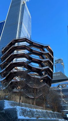 an unusual building in the middle of a city