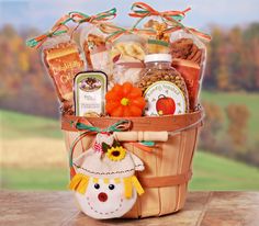 a basket filled with food sitting on top of a wooden table