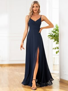 This sultry spaghetti strap bridesmaid dress features a low back, pleated v-neck, and cinched waist for a classic A-line silhouette with a floor-length fit. A daring high slit on the front reveals your heels of choice, perfect for any wedding theme. Fit: Please refer to Size Chart. Length: Floor Length. Sleeve Style: Sleeveless. Closure: It is Concealed a Zipper Up The Back. Undergarments: It is not Padded, with Lining. Fabric:The garment comprises Chiffon. Stretch: Fabric is No Stretch. Occasio Braidmaids Dresses, Prom Dress Fairy, Formal Wedding Guest Dresses, Navy Prom Dress, Infinity Gown, Elegant Evening Dresses Long, Matric Dress, Military Ball Dress, Bridesmaid Gown Chiffon