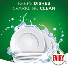 an advertisement for fairy dishwashers with water splashing on the plate and green background