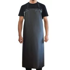 a man wearing an apron and black t - shirt standing in front of a white background