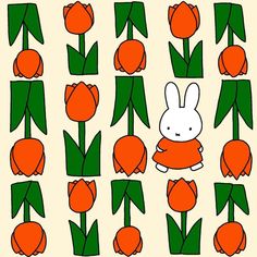 an image of a rabbit surrounded by tulips