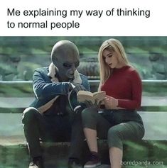 a woman sitting next to an alien reading a book with the caption me explaining my way of thinking to normal people