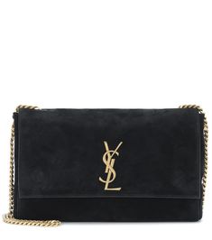 Saint Laurent's latest Kate bag is fully reversible, wear it suede-side-out or change to smooth leather as your mood suits. A gleaming YSL emblem nestles on the flap of both sides for assured recognition. Latest Kate, Kate Bags, Bottega Veneta Bags, Mini Rodini, Gucci Accessories, Saint Laurent Bag, Leather Items, Medium Bags, Leather Ankle Boots