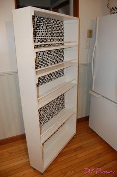 a white refrigerator freezer sitting inside of a kitchen