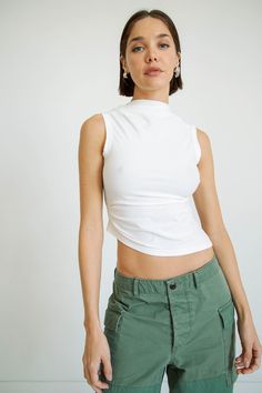 SELMA TANK TOP OFF-WHITE – The Line by K Summer Tops With Ruched Sides And Elastane, Fitted Summer Muscle Tee Tank, Fitted Summer Tank Muscle Tee, Fitted Tank Muscle Tee For Summer, Flattering Fitted Sleeveless Top, Ruched Elastane Tank Top, Stretch Ruched Tank Top, Fitted Muscle Tee For Spring, Fitted Tops For Layering With Tank Straps