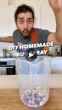 a man making homemade bug spray in a blender