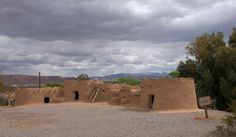 an adobe - style building in the middle of nowhere