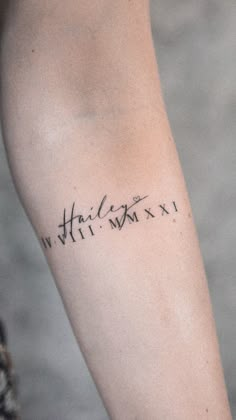 a woman's arm with writing on it that says, hailies xxii