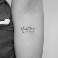 a woman's arm with a tattoo on it that reads, martinia 19 - 01 - 2013