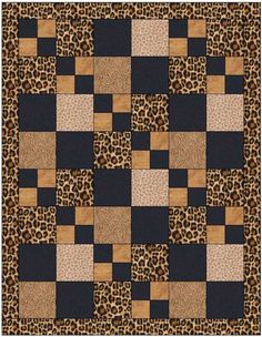 an animal print quilt with leopard and cheetah squares