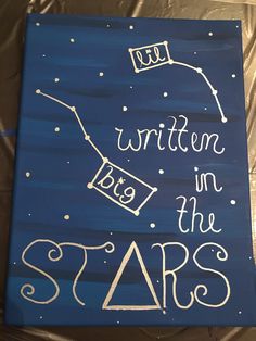 a painting with writing on it that says written in the stars