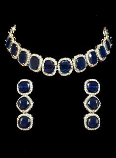 "Best Seller! Patil I - Modern Kundan Bridal Set with Blue Onyx Stone Indian bridal set makes every bride's outfit perfect. This royal blue onyx is further accented with tiny Kundan gems all around making it exquisite. Beautiful gemstones adorn this necklace choker.  This jewelry set is sure to make you stand out from the crowd. This necklace set comes along with a beautiful pair of hanging earrings with blue Onyx & Kundan gems to match. Our Bridal collection is handmade with love & care. It mak Luxury Blue Kundan Necklace, Luxury Blue Kundan Necklace As Gift, Kundan Bridal Set, Minimal Choker, Blue Choker, Blue Stone Necklace, Beautiful Gemstones, Blue Onyx, Kundan Earrings