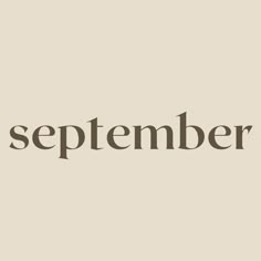 the word september written in brown on a beige background