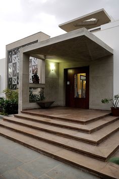 a house with steps leading up to the front door