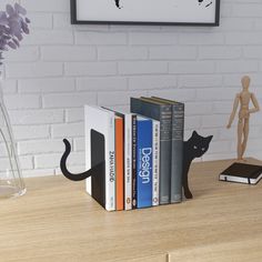 Cat Metal Bookend DETAILS ★These unique and beautiful bookends must be an ideal gift for anyone on your list ★Produced from 1.5mm sheet metal ★Elektrostatic powder coated matte black paint ★It is easy to clean ★Product dimensions are on average 19 x 10 x 16 cm (wxdxh) per piece ★Our bookends are 2 separate pieces that you can place any number of books between the pieces.2 pieces, not connected ★Thank you for visiting us ★Visit our shop for other metal wall art designs https://artekametalwallart. Black Bookshelf Decor, Cat Bookends, Animal Bookends, Craft Presents, Rustic Wall Clock, Minimalist Wall Clocks, Bedroom Wall Clock, Rustic Wall Clocks, Living Room Clocks