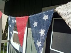 some red white and blue bunting on a porch