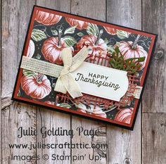 a close up of a thanksgiving card on a wooden surface