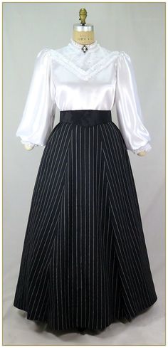 "Linen/Cotton. Color: Black and white. Medium weight yarn dyed pinstripe black and white stripe linen blend woven fabric with a graceful drape. Victorian style skirt cut in 3 gore style for the silhouette of the period. Comfortable matching black and white stripe elastic waistband. Total circumference approx. 94\"' at hemline. Wide variety of sizes and lengths. Dry clean. Circa 1890-1905. Made in U.S.A. Sizes: SM, MED, LG, XLG & 2XLG. Size Assistance for Elastic Waist Skirt: SM fits up to 26\" w Diy Victorian Dress, Elegant Striped Relaxed Skirt, Striped Pleated Fitted Skirt, Fitted Black Skirt With Vertical Stripes, Elegant Fitted Striped Skirt, Drow Fashion, Matilda Vibes, Victorian Era Outfits, Late Victorian Fashion