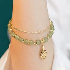 Embrace the Serenity and Elegance of the Hetian Jade Gold Leaf Bracelet A Harmonious Blend of Tradition and Style: In the world of fine jewelry, the Hetian Jade Gold Leaf Bracelet stands as a paragon of elegance and cultural significance. This exquisite bracelet is not just an accessory; it is a symbol of tranquility, prosperity, and the enduring beauty of nature. Ideal for the discerning individual who cherishes both the aesthetic and the meaningful, this bracelet represents a seamless blend of Double Chain Bracelet, Bracelets Design, Hetian Jade, Leaf Bracelet, Beads Bracelet Design, Jade Bracelet, Bracelet Design, Layered Jewelry, Fancy Jewelry