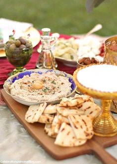 an assortment of food sitting on a table