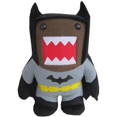 a stuffed animal with an open mouth and teeth in the shape of a batman costume