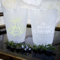 two frosted cups sitting on top of a table