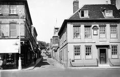 an old black and white photo of some buildings