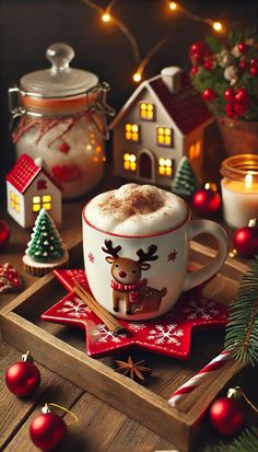 a cup of hot chocolate with marshmallows and christmas decorations