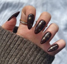 Fall is here and it's time to switch up your nail game! 🍂 These short fall nails are perfect for the season and will give you major cozy vibes. #fallnails #shortnails #cozynails #autumnnails #nailinspo #nailtrends #nailsofinstagram #nailart #fallvibes #nailgoals 💅🏼 Which design is your favorite? Let us know in the comments below! 👇🏼 #naillove #fallcolors #naildesigns #nailfashion Holiday Nails November, Short Brown Nails With Design, Black Brown Nail Art, Autumnal Acrylic Nails, Nails October Halloween, Dark Nails With Stars, Brown And Gold Glitter Nails, Sparkly Fall Nails Acrylic, Witchy Autumn Nails