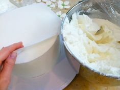 someone is mixing some food in a bowl