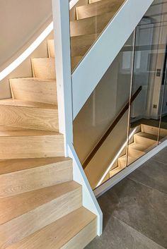 Bespoke stairs in any format, made to measure and treated to match in colour and surface structure the accompanying wooden floor. Available in solid or engineered wood. Treatment: Dom-Muschel