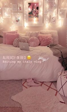 a bed with pink pillows and pictures on the wall above it that says, already in bed baking my daily vlog