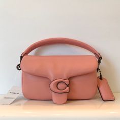 Authentic. Brand New With Tag And Dust Bag. This Is A Coach Retail Store Bag. Smoke Free And Pet Free Home. - Nappa Leather, Leather Lining - Inside Multifunction Pocket - Snap Closure - Detachable Handle With 4" Drop - Detachable Long Strap With 21 1/2" Drop For Shoulder Or Crossbody Wear - 7 1/4" (L) X 4" (H) X 2 1/2" (W) - Fits Iphone 13 Plus /Pro Max Pink Flap Bag With Detachable Strap For Shopping, Trendy Coach Satchel With Detachable Strap, Pink Top Handle Flap Bag For Everyday Use, Trendy Coach Leather Satchel, Trendy Coach Bags, Pink Satchel Flap Bag For Shopping, Trendy Coach Shoulder Bag With Top Handle, Pink Soft Leather Evening Shoulder Bag, Designer Pink Shoulder Bag For Daily Use