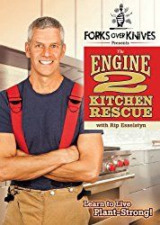 a man standing with his arms crossed in front of a sign that says engine kitchen rescue