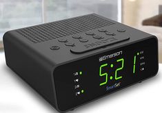 an alarm clock radio sitting on top of a table