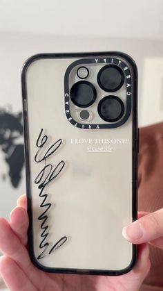 someone holding up their iphone case with the words love this one